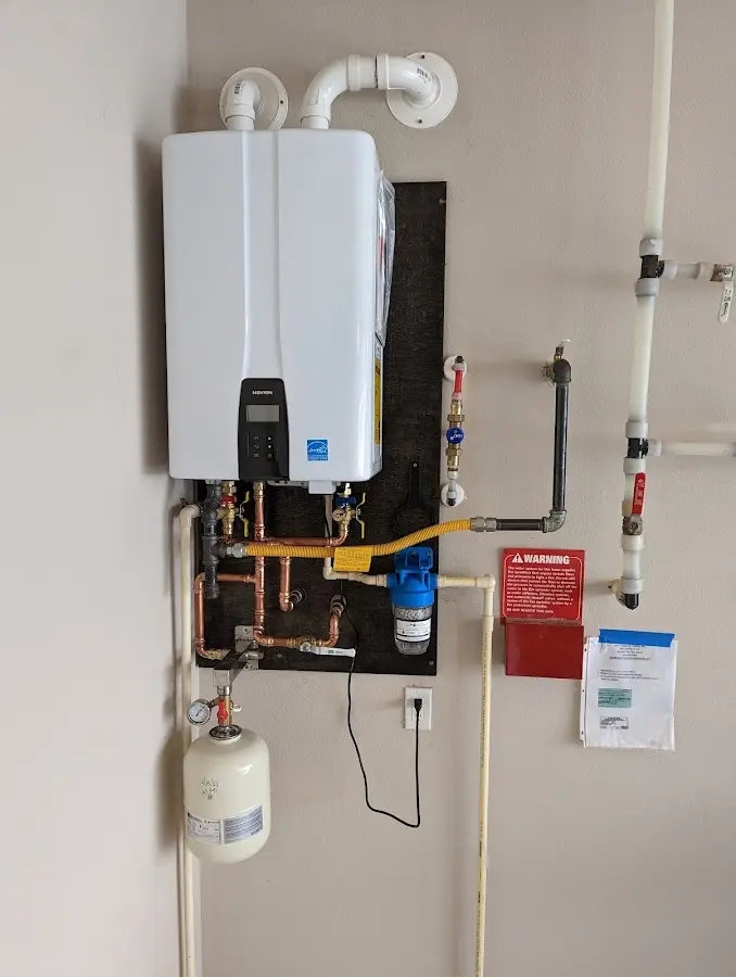 Professional plumber installing copper piping in a Rancho Mirage home